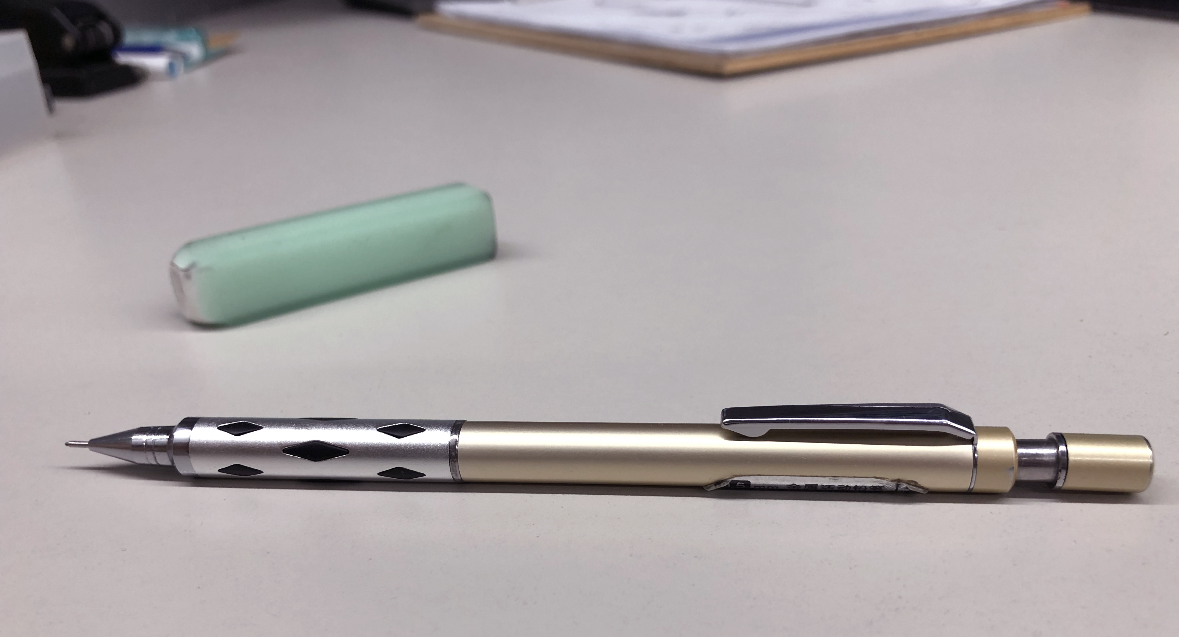 Metal pen. A metal pencil Stationery. Writing pen，