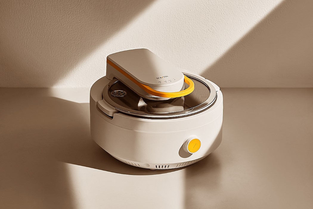 An automated stir-frying appliance that walks the walk and stirs the ...