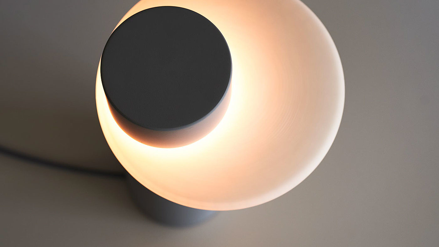 modern stylish，Black and white gray color matching，Minimalist，Warm color light source，Brain hole design，Table lamp design，Lamp design，