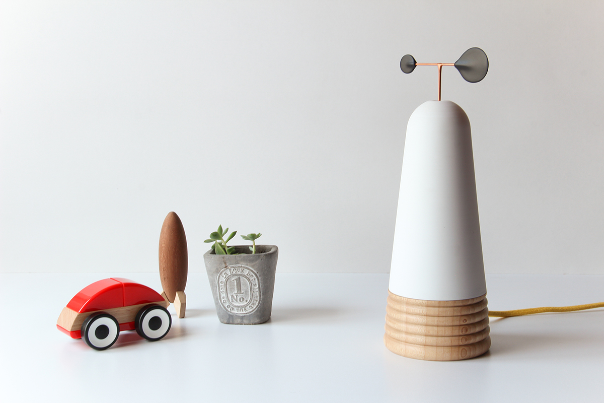 Table lamp design，sound design ，speaker，lamps and lanterns，Creative brain hole，Cylinder design，Wood and plastic，Innovative switching mode，Wind energy，Black and white matching，White and wood，