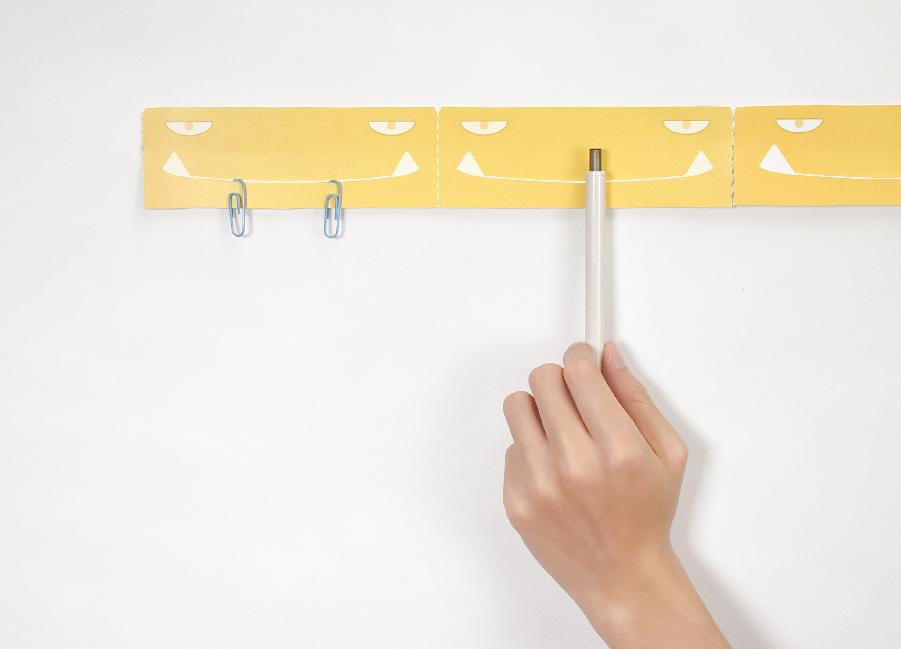 a hook，sticky note，adhesive tape，