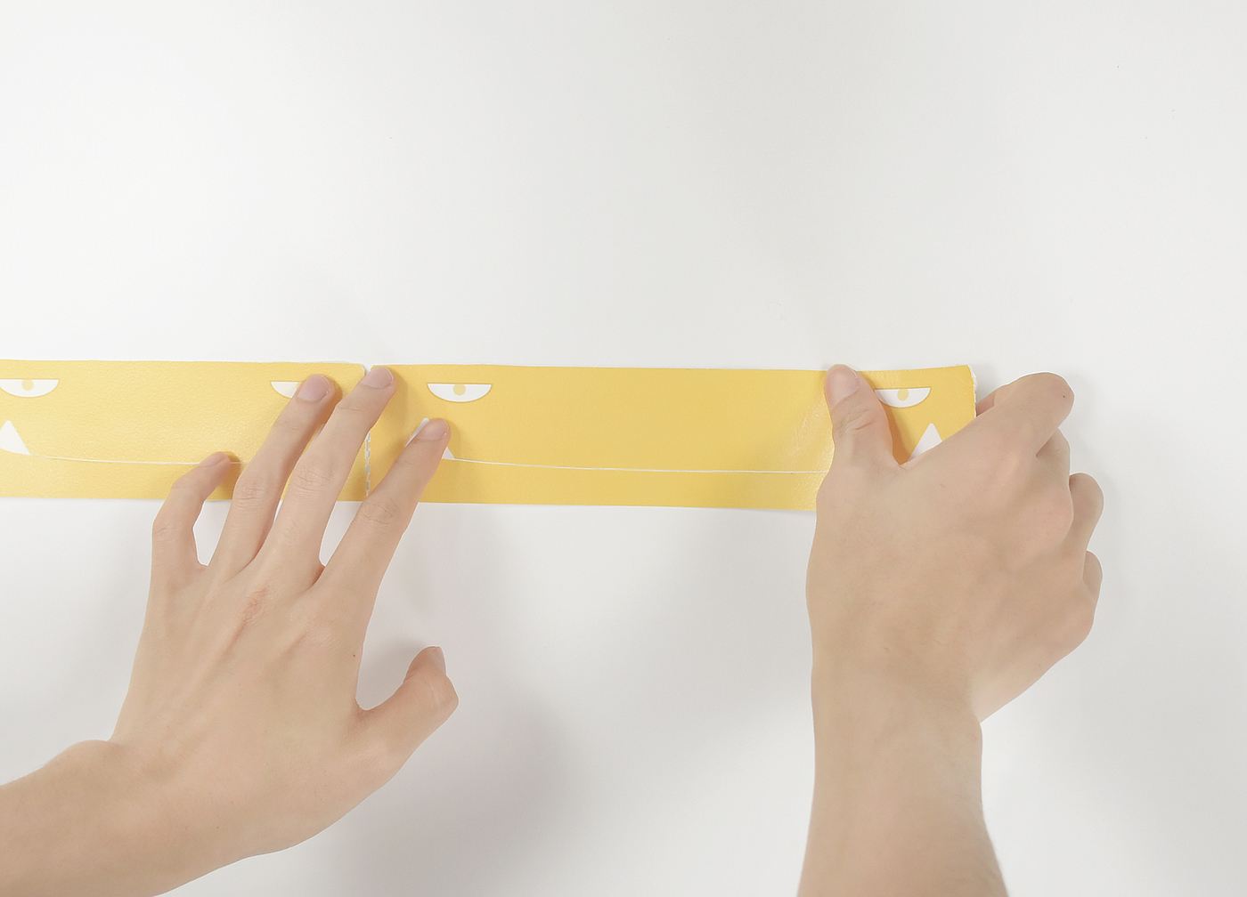 a hook，sticky note，adhesive tape，